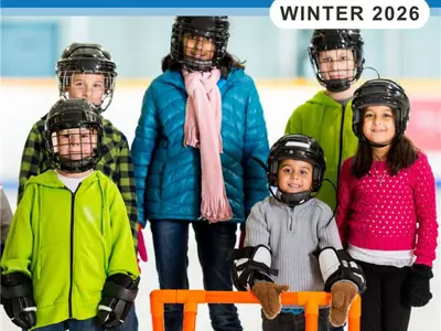 Children standing on a skating rink